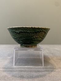 A Chinese green-glazed marbled bowl, probably Tang