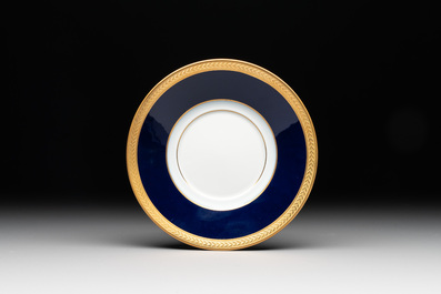 An impressive 94-piece gold-encrusted royal-blue-enamelled 'Palaiseau' service, Bernardaud, Limoges, 20th C.