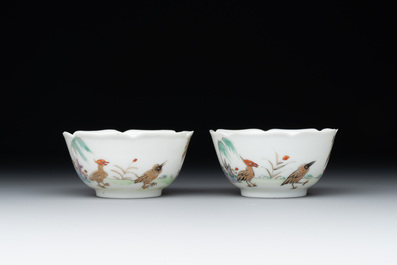 A pair of Chinese eggshell white-glazed cups and saucers, and two famille rose cups, 18th C.