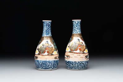 A Japanese lacquerware picnic set with two sake bottles, Meiji, 19th C.