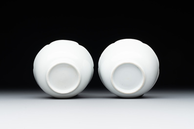 A pair of Chinese eggshell white-glazed cups and saucers, and two famille rose cups, 18th C.