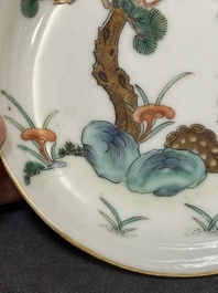 Four Chinese famille rose 'monkey and deer' saucers, Tongzhi mark and of the period