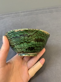 A Chinese green-glazed marbled bowl, probably Tang