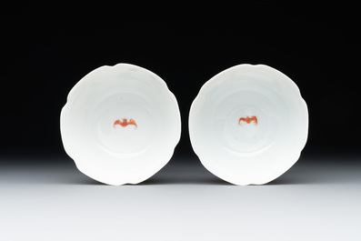 A pair of Chinese eggshell white-glazed cups and saucers, and two famille rose cups, 18th C.