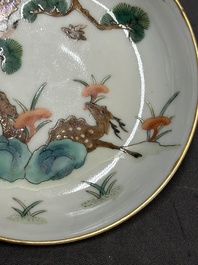 Four Chinese famille rose 'monkey and deer' saucers, Tongzhi mark and of the period