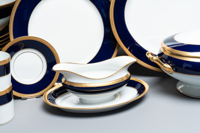 An impressive 94-piece gold-encrusted royal-blue-enamelled 'Palaiseau' service, Bernardaud, Limoges, 20th C.