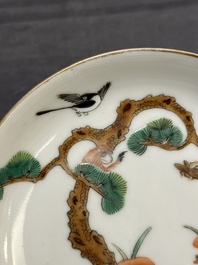 Four Chinese famille rose 'monkey and deer' saucers, Tongzhi mark and of the period