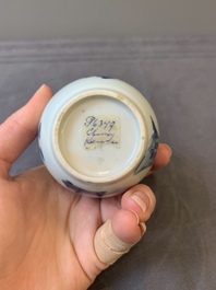 A Chinese blue and white tea caddy and cover with figural design, Kangxi