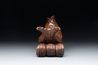 A small Kutani porcelain incense burner, two wooden sculptures, and a shagreen glasses case, Japan, Meiji, 19/20th C.