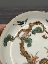Four Chinese famille rose 'monkey and deer' saucers, Tongzhi mark and of the period