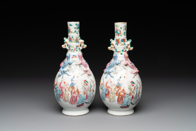 A pair of Chinese famille rose '18 Luohan' bottle vases, 19th C.