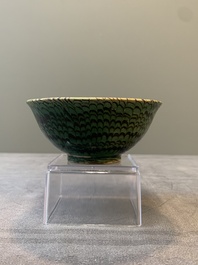 A Chinese green-glazed marbled bowl, probably Tang
