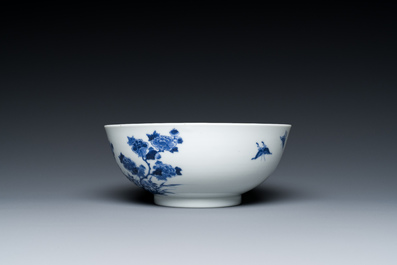 A Chinese blue and white bowl with floral design and a famille verte yellow-ground 'bamboo' bowl, Tongzhi mark, 18/19th C.
