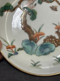 Four Chinese famille rose 'monkey and deer' saucers, Tongzhi mark and of the period