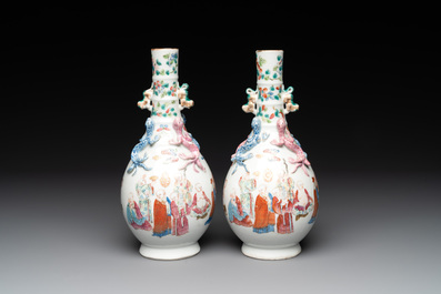 A pair of Chinese famille rose '18 Luohan' bottle vases, 19th C.