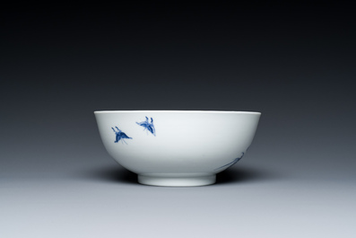 A Chinese blue and white bowl with floral design and a famille verte yellow-ground 'bamboo' bowl, Tongzhi mark, 18/19th C.