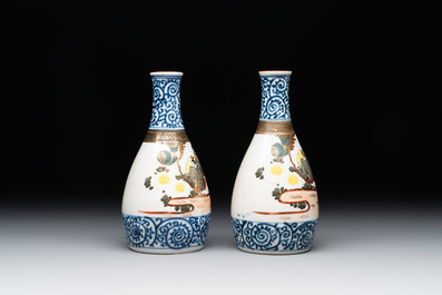 A Japanese lacquerware picnic set with two sake bottles, Meiji, 19th C.