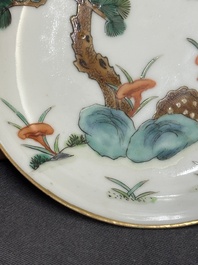 Four Chinese famille rose 'monkey and deer' saucers, Tongzhi mark and of the period