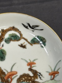 Four Chinese famille rose 'monkey and deer' saucers, Tongzhi mark and of the period
