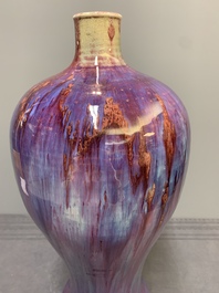 A Chinese flamb&eacute;-glazed 'meiping' vase on wooden stand, 18/19th C.
