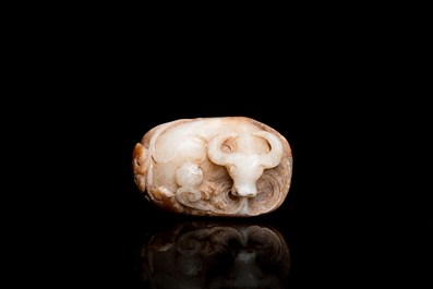 Four Chinese white, celadon and russet jade pendants, Qing/Republic