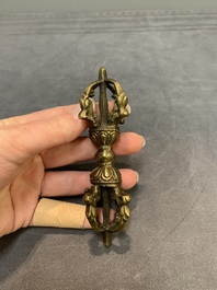 Three Tibetan bronze vajra and a copper incense burner, 18/20th C.