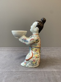 A Chinese famille rose figure of a lady presenting a bowl, Qianlong