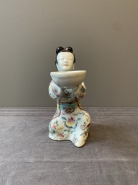 A Chinese famille rose figure of a lady presenting a bowl, Qianlong