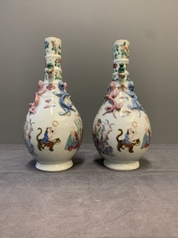 A pair of Chinese famille rose '18 Luohan' bottle vases, 19th C.