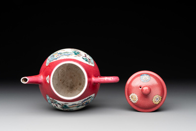A Chinese famille rose ruby-ground 'landscape scroll' teapot, Yongzheng