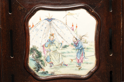 A Chinese four-fold wooden room divider with famille rose 'Romance of the Western Chamber' plaques, Republic