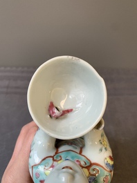 A Chinese famille rose figure of a lady presenting a bowl, Qianlong