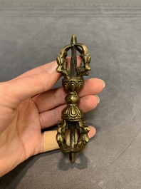 Three Tibetan bronze vajra and a copper incense burner, 18/20th C.