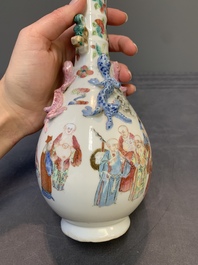 A pair of Chinese famille rose '18 Luohan' bottle vases, 19th C.
