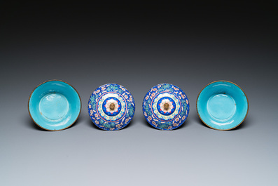 A pair of Chinese Canton enamel bowls and covers with floral design, Qianlong