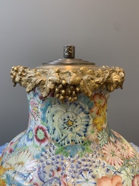A Chinese famille rose 'millefleurs' vase mounted as lamp, Qianlong mark, Republic