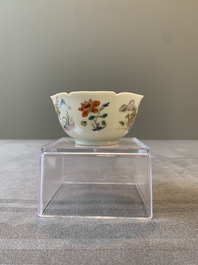A Chinese polychrome-decorated cup and saucer with ducks and flowers, Yongzheng