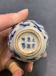 A pair of Chinese blue and white soft paste '100 boys' covered jarlets and a seal paste box, Kangxi mark, 19th C.