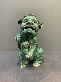 A Chinese verte biscuit group of a Buddhist lion with cub, 19th C.