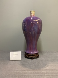A Chinese flamb&eacute;-glazed 'meiping' vase on wooden stand, 18/19th C.