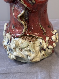 A Chinese Shiwan flamb&eacute;-glazed figure of a Luohan, Deng 邓 seal mark, dated 1927