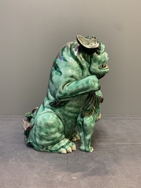 A Chinese verte biscuit group of a Buddhist lion with cub, 19th C.