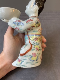 A Chinese famille rose figure of a lady presenting a bowl, Qianlong