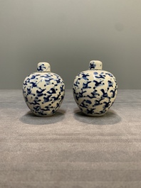 A pair of Chinese blue and white soft paste '100 boys' covered jarlets and a seal paste box, Kangxi mark, 19th C.