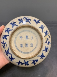 A pair of Chinese blue and white soft paste '100 boys' covered jarlets and a seal paste box, Kangxi mark, 19th C.