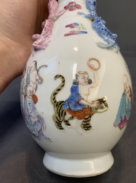 A pair of Chinese famille rose '18 Luohan' bottle vases, 19th C.