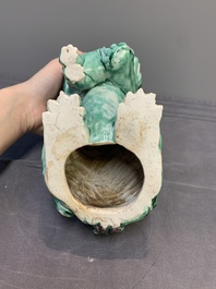 A Chinese verte biscuit group of a Buddhist lion with cub, 19th C.