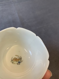 A Chinese polychrome-decorated cup and saucer with ducks and flowers, Yongzheng