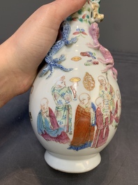 A pair of Chinese famille rose '18 Luohan' bottle vases, 19th C.