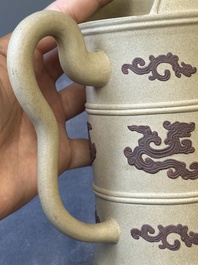 A pair of very rare Chinese Yixing stoneware 'duomuhu' ewers and covers, Kangxi